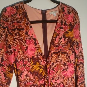 Floral Print Long Bell Sleeve Romper by B. DARLIN